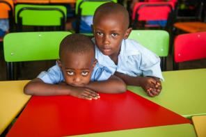 Two kindergarten students in one of Kigali's top performing schools